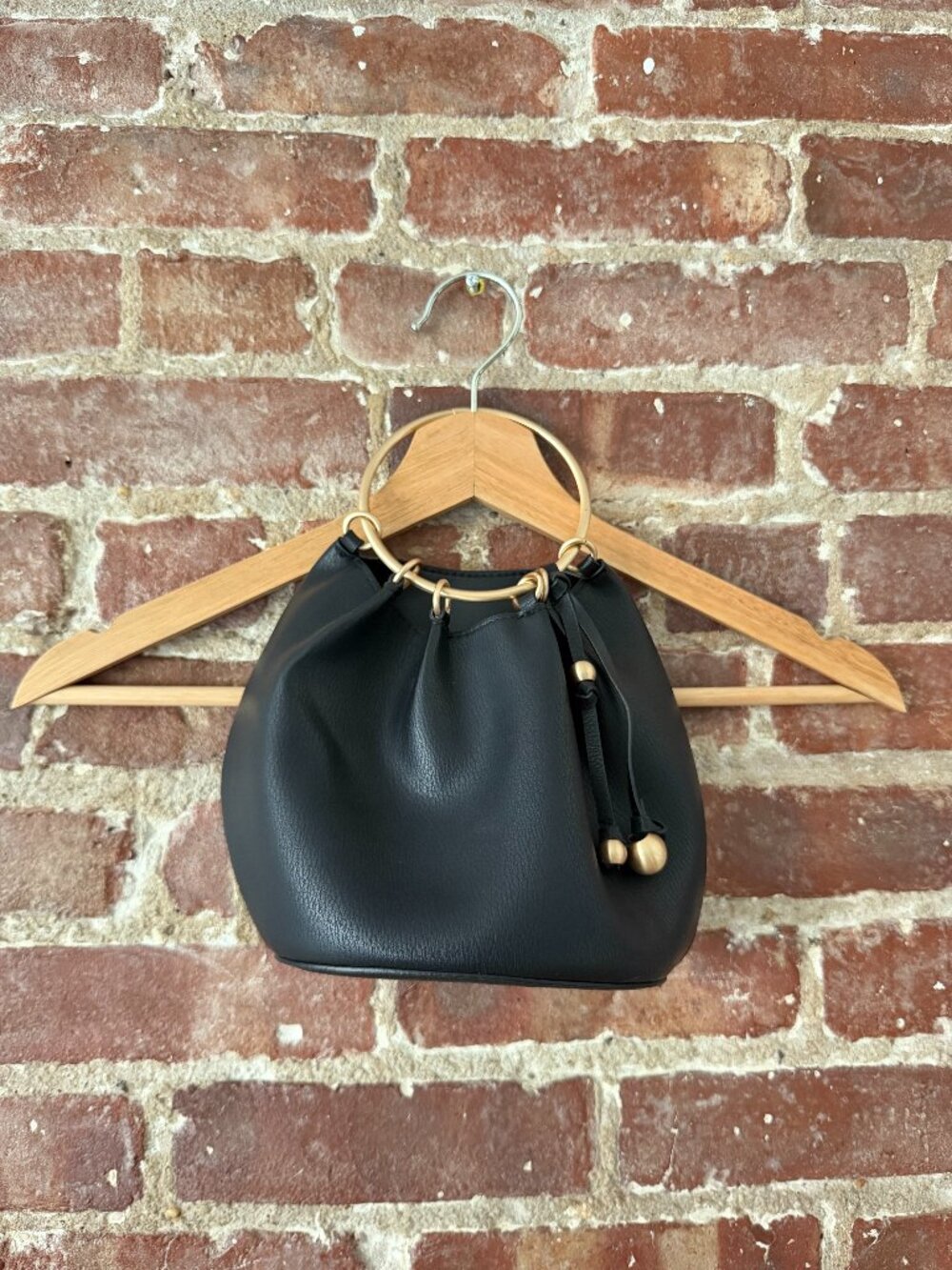 Black Pebbled Leather Bucket Bag Gold Ring Handle Drawstring Tassel Unique